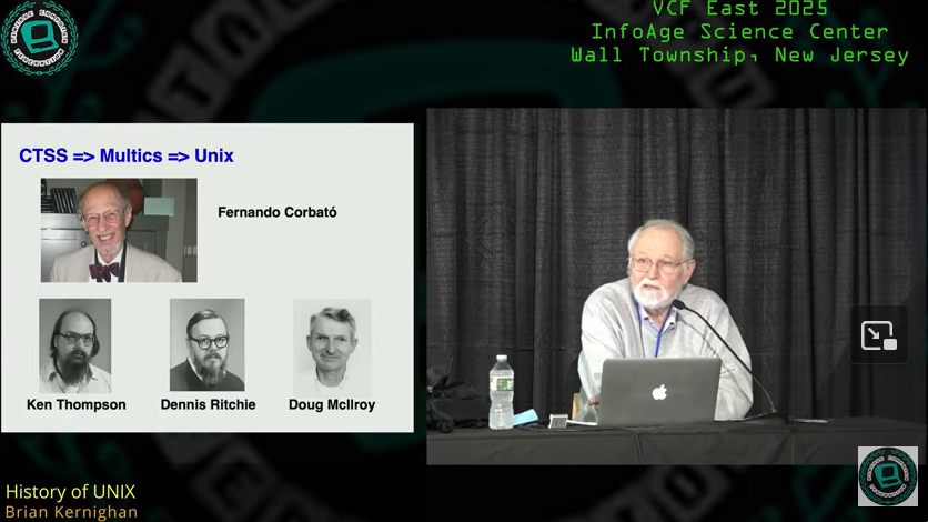 Multics slide - 83-year-old Brian Kernighan laughs at Vintage Computer Festival East (2025) - hands up
